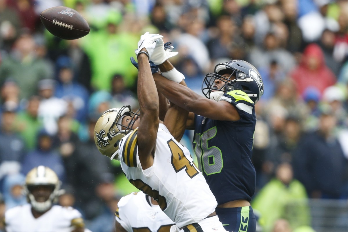 New Orleans Saints safety Marcus Williams (43) breaks up a pass intended for Seattle receiver Tyler Lockett (16). Mandatory Credit: Joe Nicholson-USA TODAY Sports