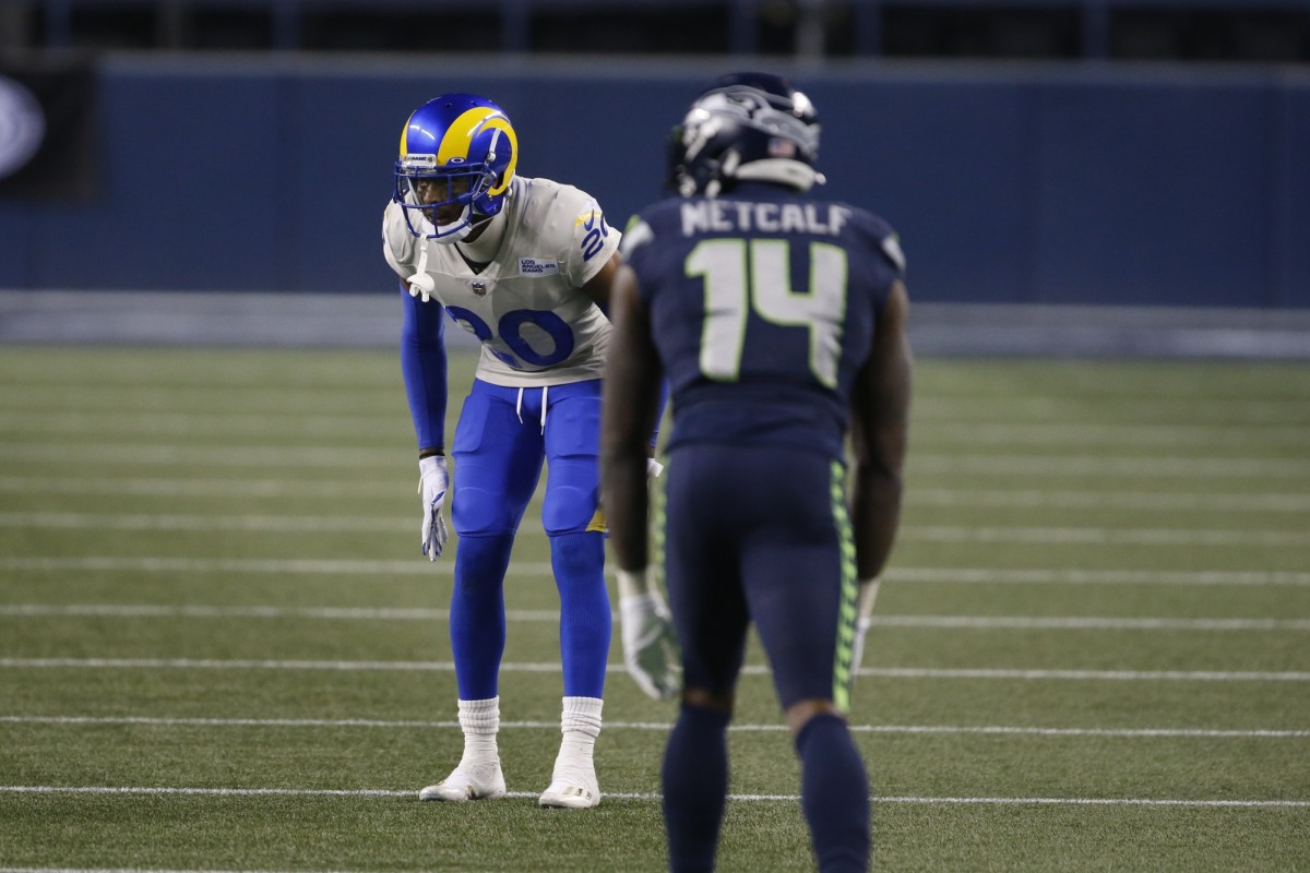 Los Angeles Rams cornerback Jalen Ramsey (20) guards Seattle Seahawks wide receiver DK Metcalf (14). Mandatory Credit: Joe Nicholson-USA TODAY Sports