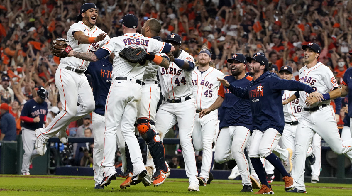 Oct 22, 2021; Houston, Texas, USA; Houston Astros relief pitcher Ryan Pressly (55) celebrates with teammates after defeating the Boston Red Sox to advance to the World Series after winning game six of the 2021 ALCS at Minute Maid Park.