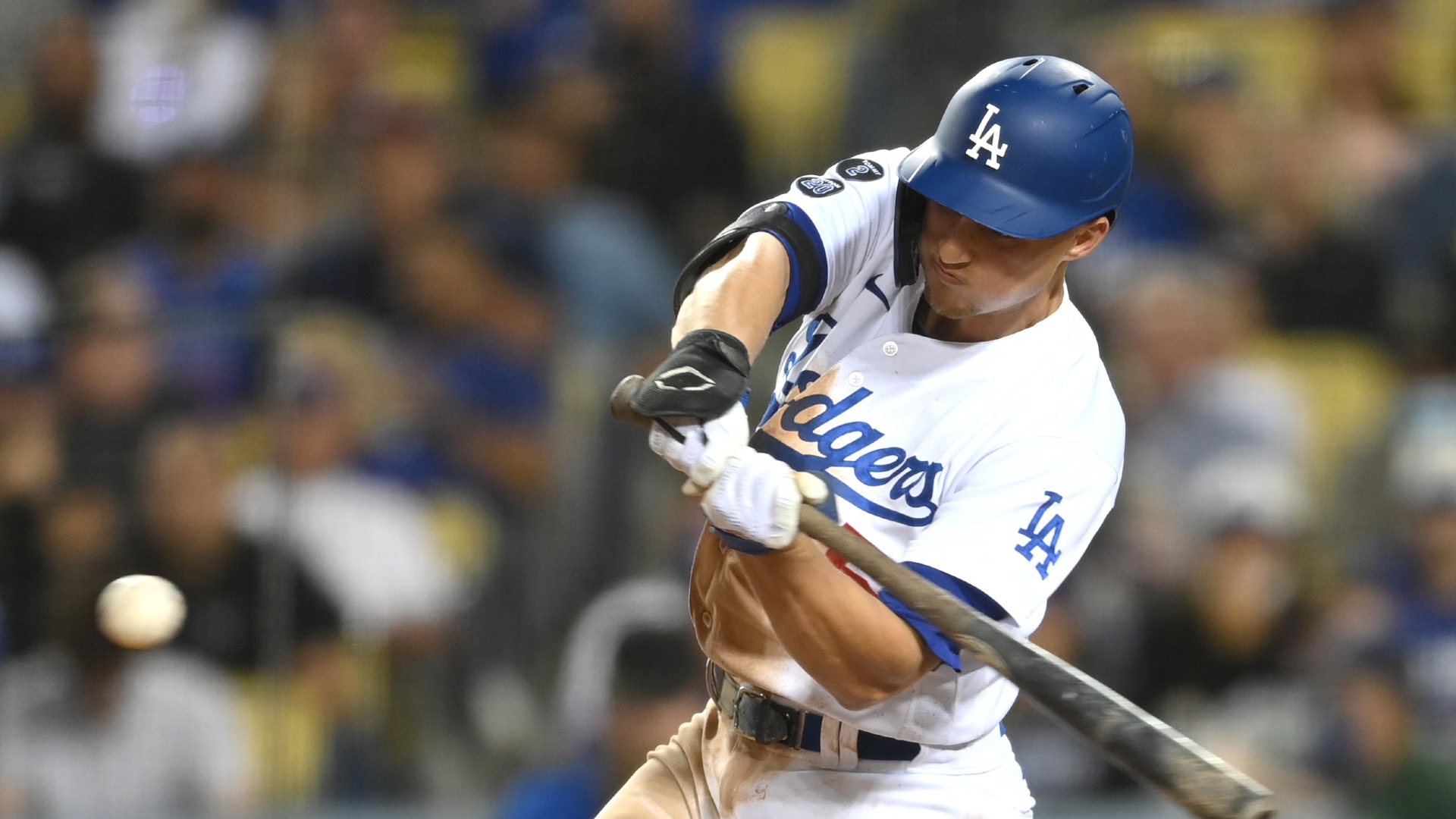 Sep 30, 2021; Los Angeles, California, USA; Los Angeles Dodgers shortstop Corey Seager (5) hits a solo home run in the seventh inning of the game against the San Diego Padres at Dodger Stadium. Mandatory Credit: Jayne Kamin-Oncea-USA TODAY Sports