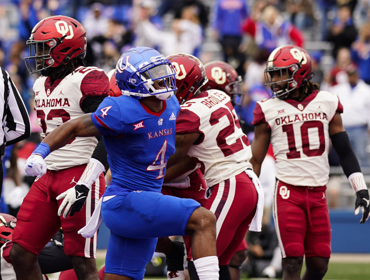 KU's Devin Neal scored two touchdowns and rushed for 100 yards against the OU defense.