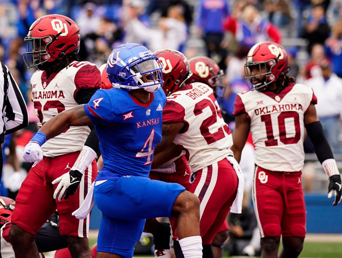 KU's Devin Neal scored two touchdowns and rushed for 100 yards against the OU defense.