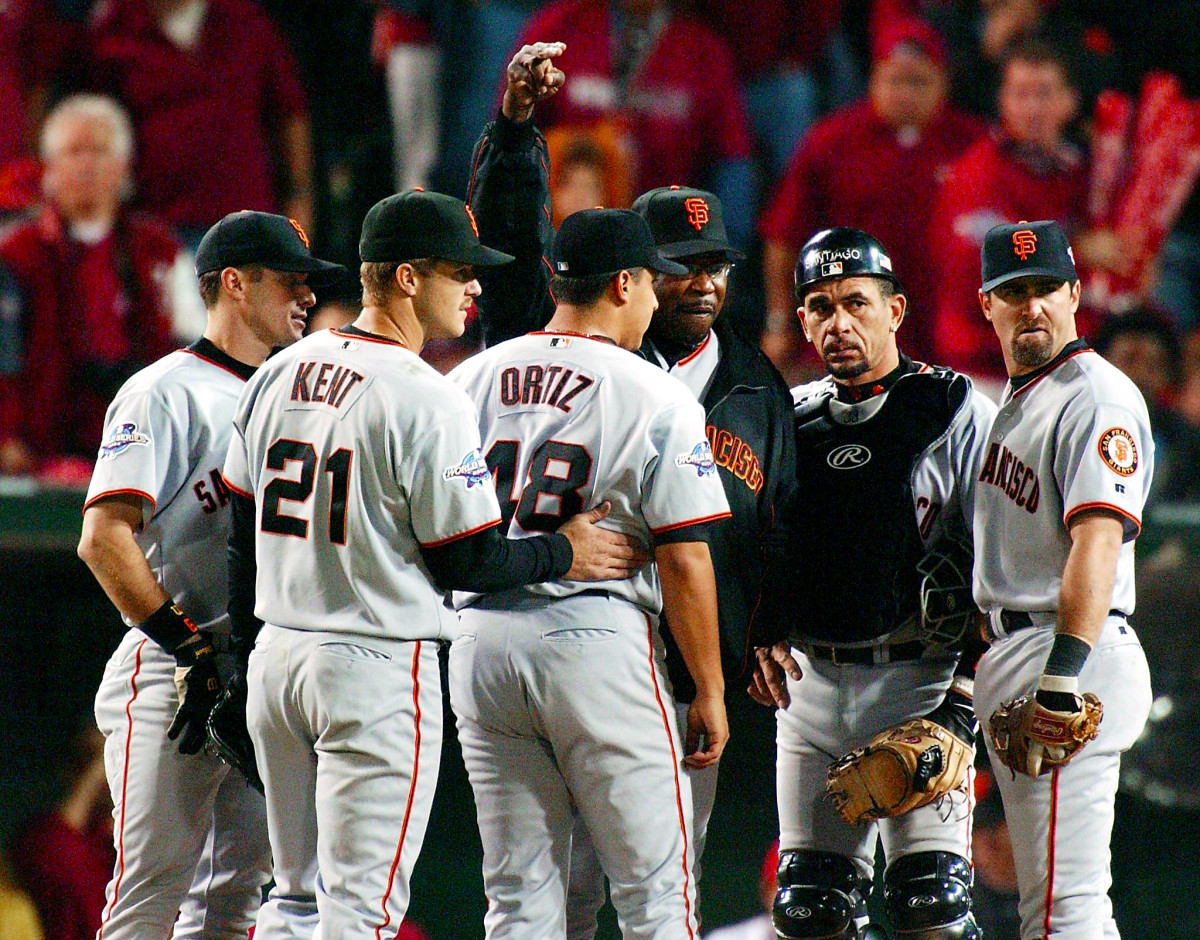 Dusty Baker removing starting pitcher Russ Ortiz in the seventh inning with one out and two on Game 6 of the 2002 World Series.