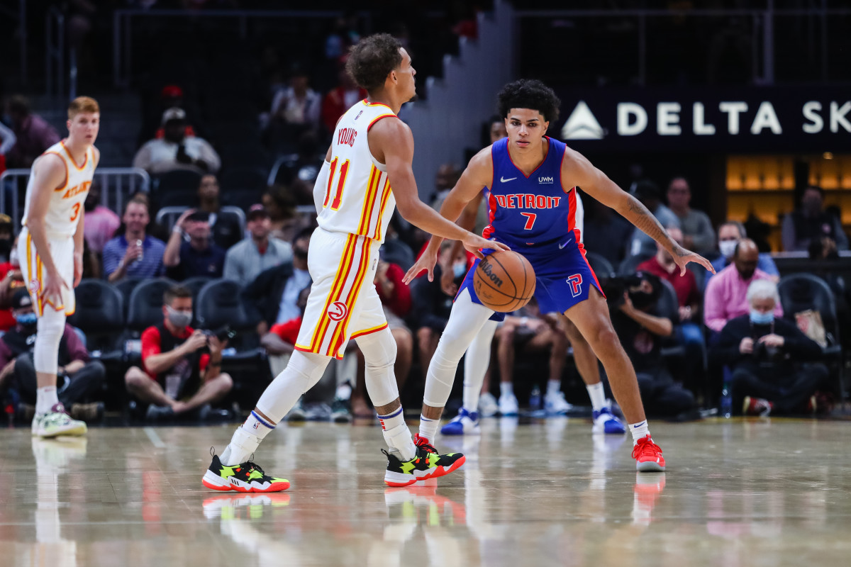 Detroit Pistons guard Killian Hayes (7) defends against Atlanta Hawks guard Trae Young (11) during the first quarter at State Farm Arena.