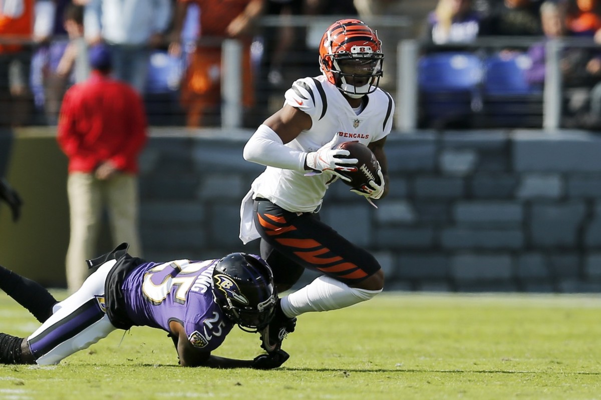 Oct 24, 2021; Baltimore, MD, USA; Cincinnati Bengals wide receiver Ja'Marr Chase (1) turns with a catch in the second quarter of the NFL Week 7 game between the Baltimore Ravens and the Cincinnati Bengals at M&T Bank Stadium in Baltimore on Sunday, Oct. 24, 2021. Mandatory Credit: Sam Greene-USA TODAY Sports