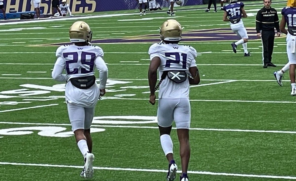 Julius Irvin and Dom Hampton team up at practice.