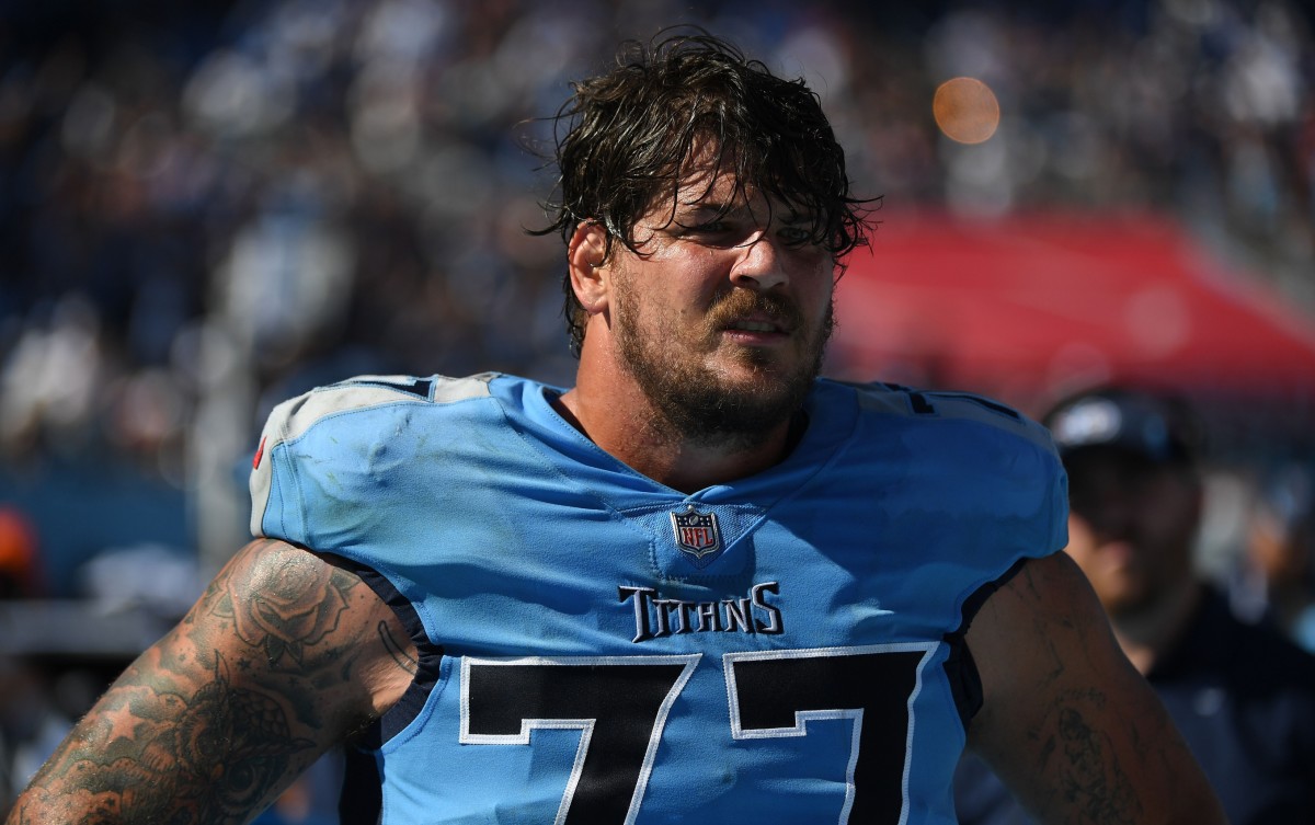 Tennessee Titans offensive tackle Taylor Lewan (77) on the sideline during the second half against the Indianapolis Colts at Nissan Stadium.