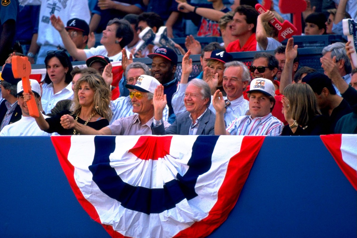 Ted Turner waves around his tomahawk in public 