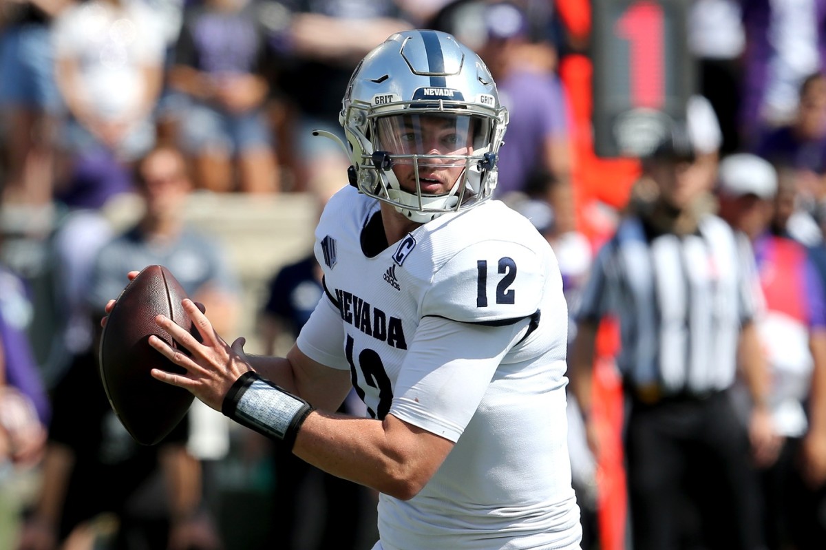 Nevada Wolf Pack quarterback Carson Strong (12) drops back to pass during the first quarter against the Kansas State Wildcats at Bill Snyder Family Football Stadium.