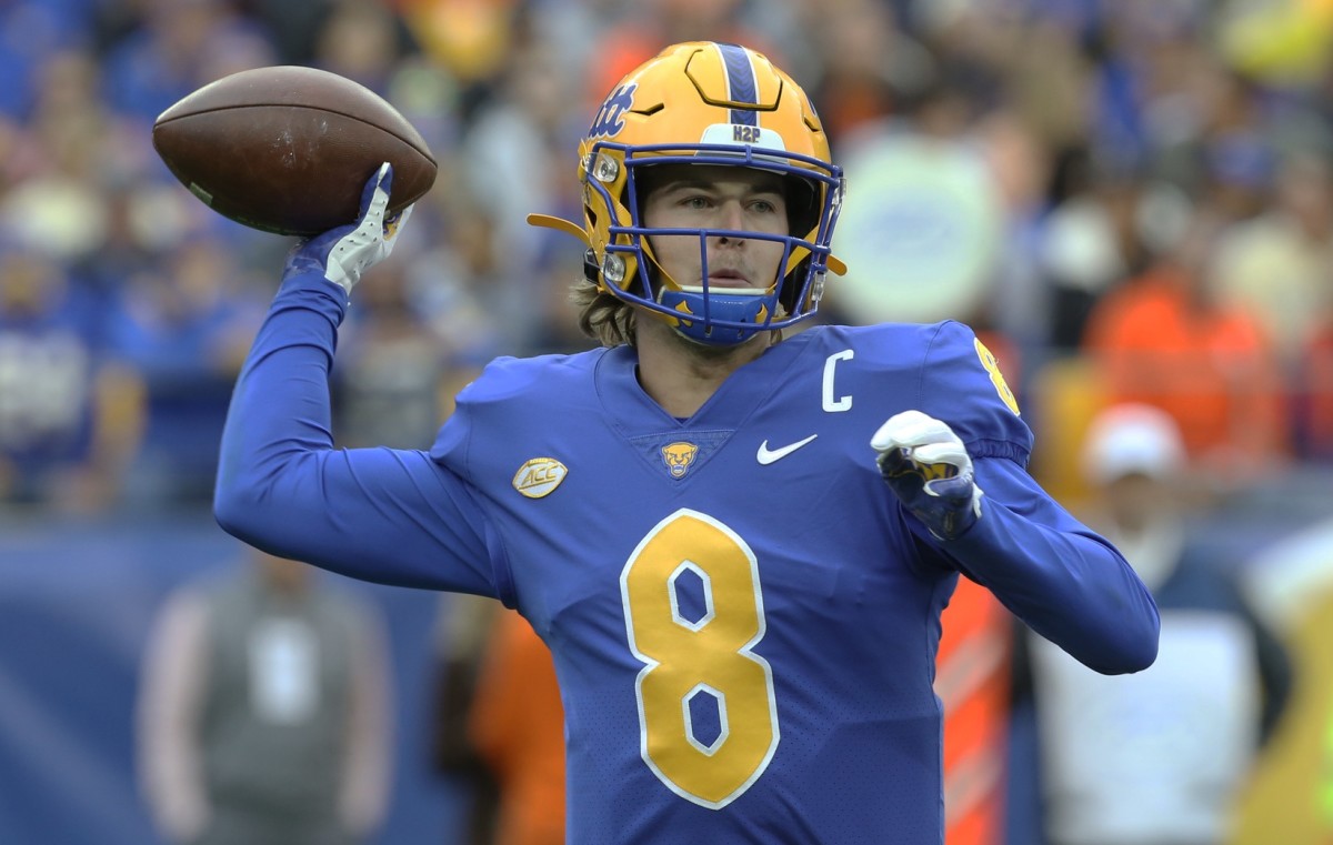 Pittsburgh Panthers quarterback Kenny Pickett (8) passes against the Clemson Tigers during the first quarter at Heinz Field.