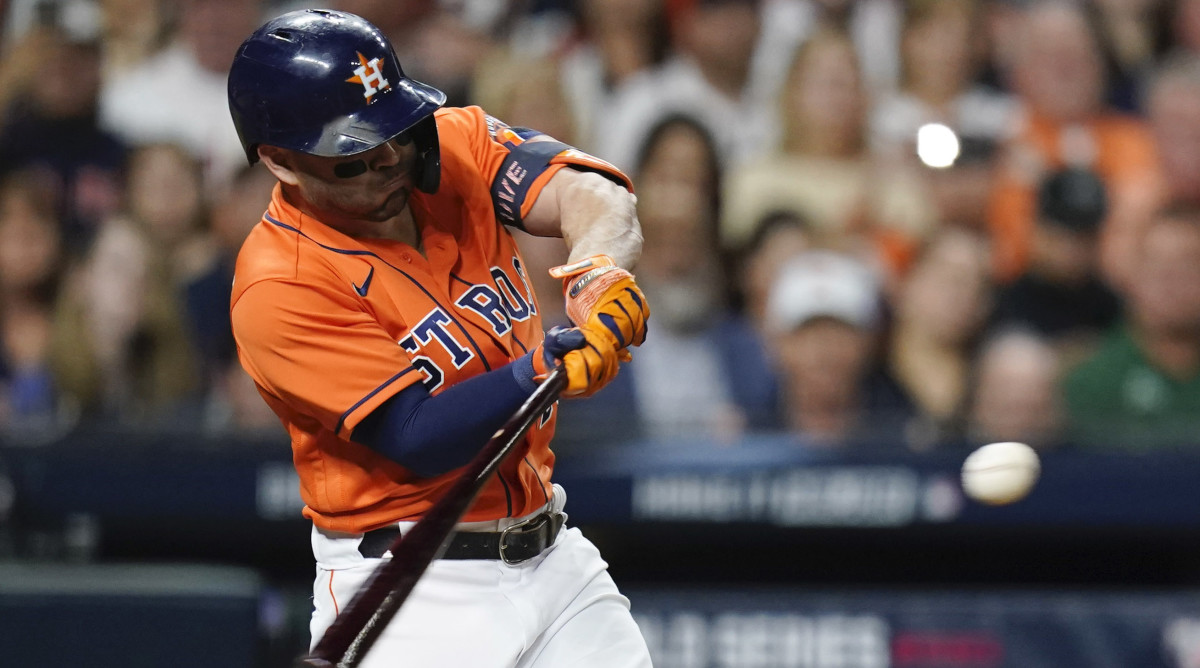 Houston Astros second baseman Jose Altuve hits a double against the Atlanta Braves during the second inning in game two of the 2021 World Series at Minute Maid Park.