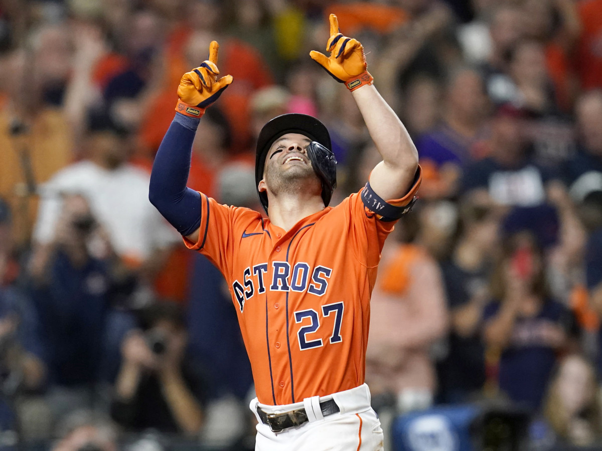Oct 27, 2021; Houston, TX, USA; Houston Astros second baseman Jose Altuve (27) celebrates after hitting a solo home run against the Atlanta Braves during the seventh inning in game two of the 2021 World Series at Minute Maid Park.