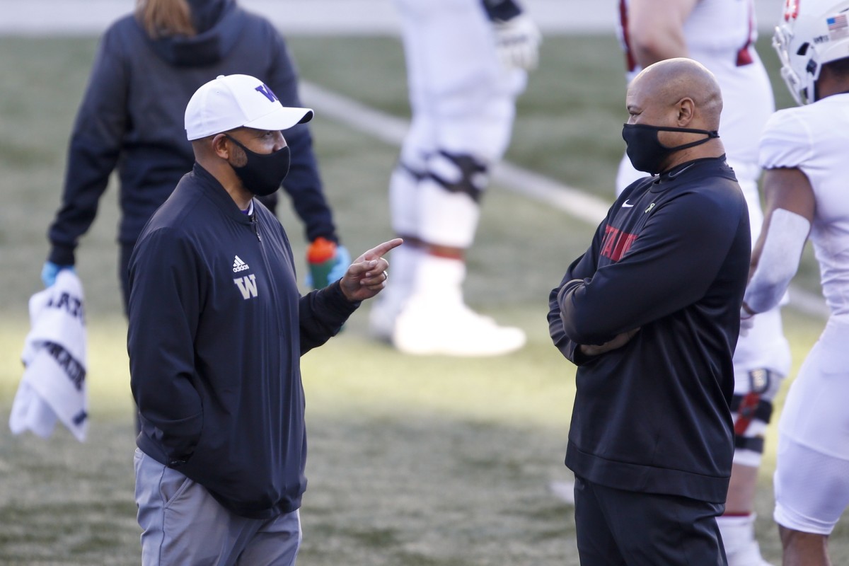 Jimmy Lake and David Shaw chat before their 2020 game at Husky Stadium.