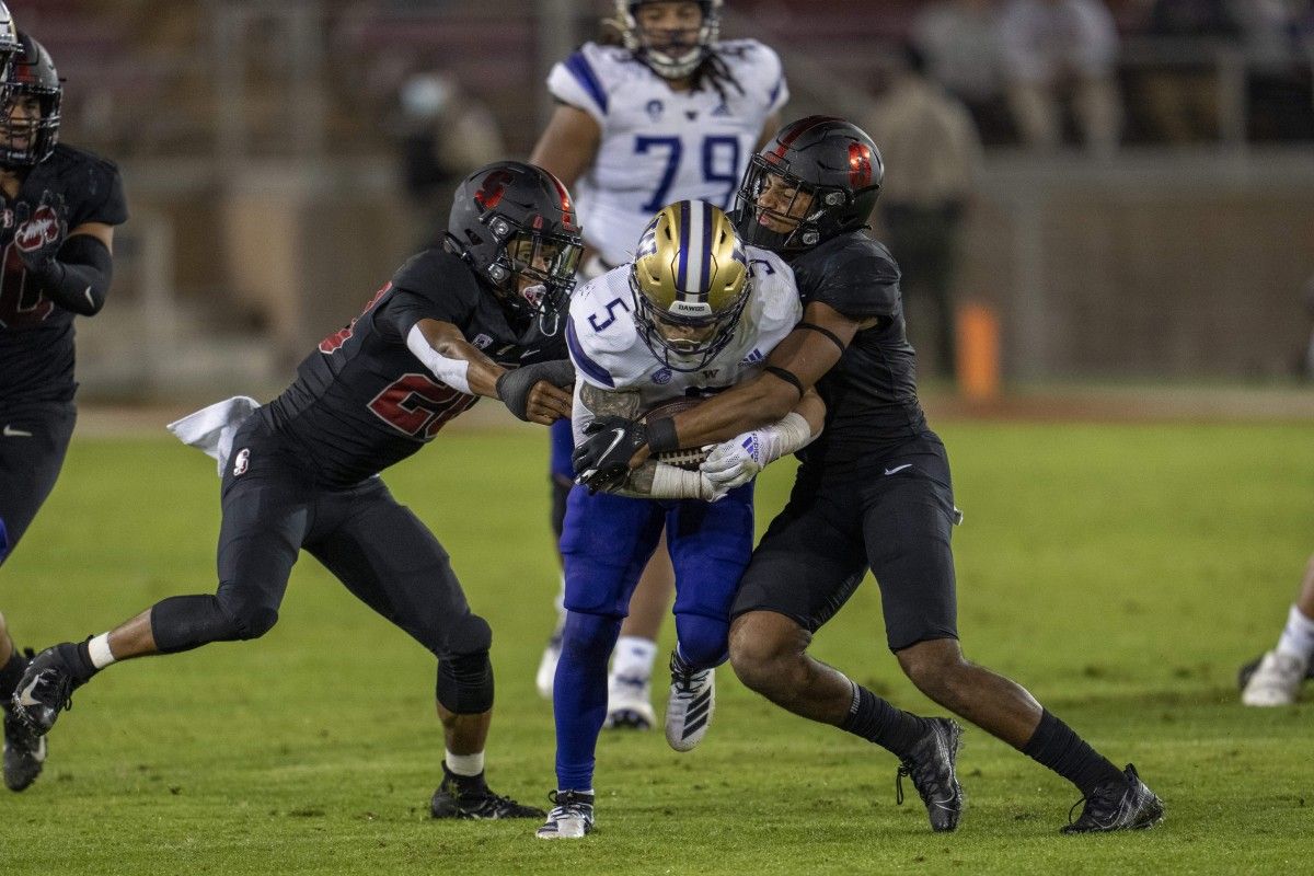 Sean McGrew picks up some of his 114-yards rushing against Stanford.
