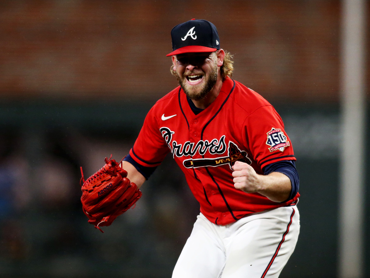 Oct 29, 2021; Atlanta, Georgia, USA; Atlanta Braves relief pitcher A.J. Minter (33) reacts against the Houston Astros during the sixth inning during game three of the 2021 World Series at Truist Park.