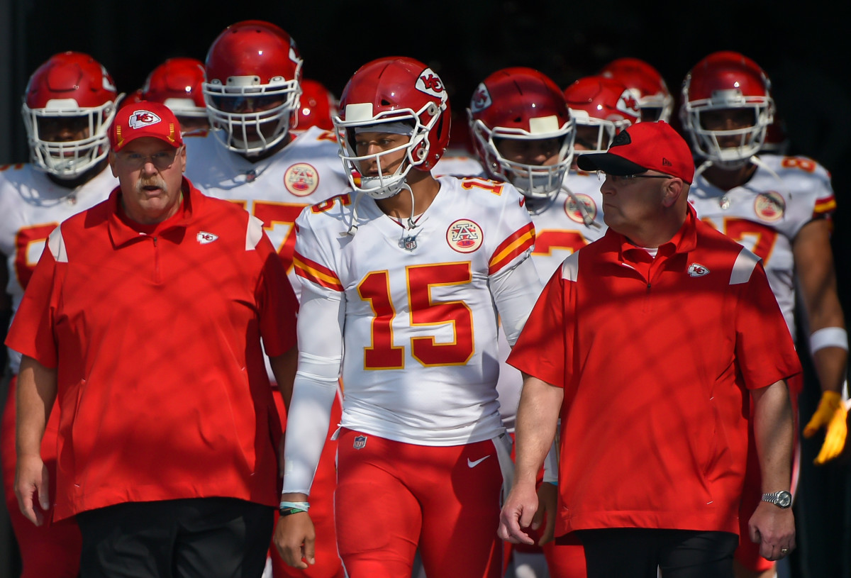 Oct 24, 2021; Nashville, Tennessee, USA; Kansas City Chiefs quarterback Patrick Mahomes (15) stands with Kansas City Chiefs head coach Andy Reid just prior to taking the field against the Tennessee Titans at Nissan Stadium. Mandatory Credit: Steve Roberts-USA TODAY Sports