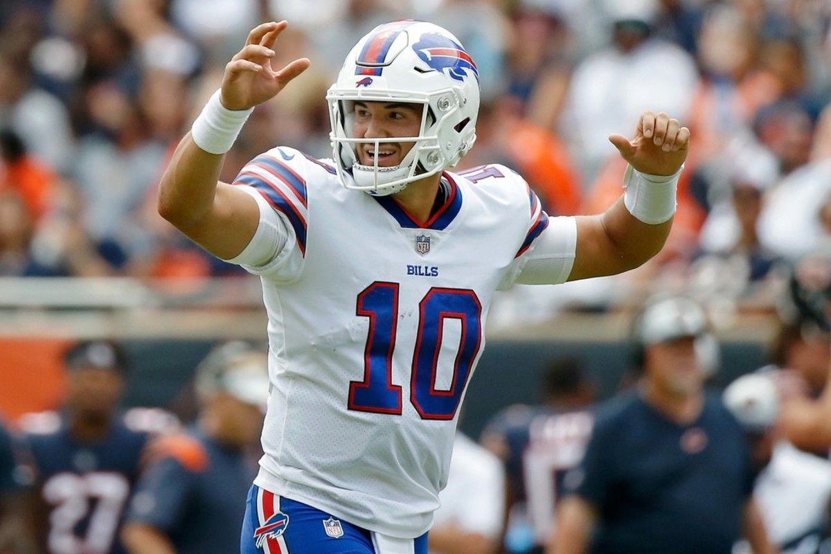 Buffalo Bills quarterback Mitchell Trubisky (10) smiles after a touchdown against the Chicago Bears during the first half at Soldier Field.