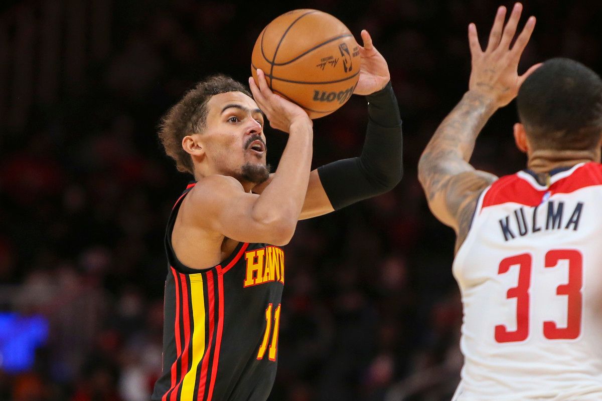 Atlanta Hawks guard Trae Young (11) shoots against the Washington Wizards in the second half at State Farm Arena.