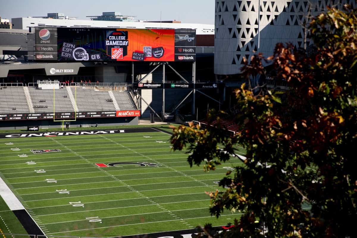 The College GameDay logo is displayed on one of the mega screen at Nippert Stadium at the University of Cincinnati on Friday, Nov. 5, 2021, in Cincinnati. ESPN's College GameDay show will be held in the McMicken Commons on Saturday for the NCAA football game between Cincinnati and Tulsa. College Gameday Setup 27