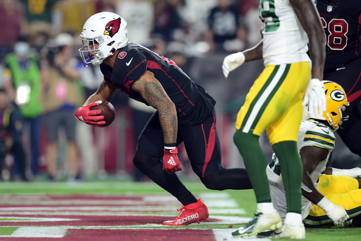 Oct 28, 2021; Glendale, Arizona, USA; Arizona Cardinals running back James Conner (6) scores a touchdown against the Green Bay Packers during the second half at State Farm Stadium. Mandatory Credit: Joe Camporeale-USA TODAY Sports