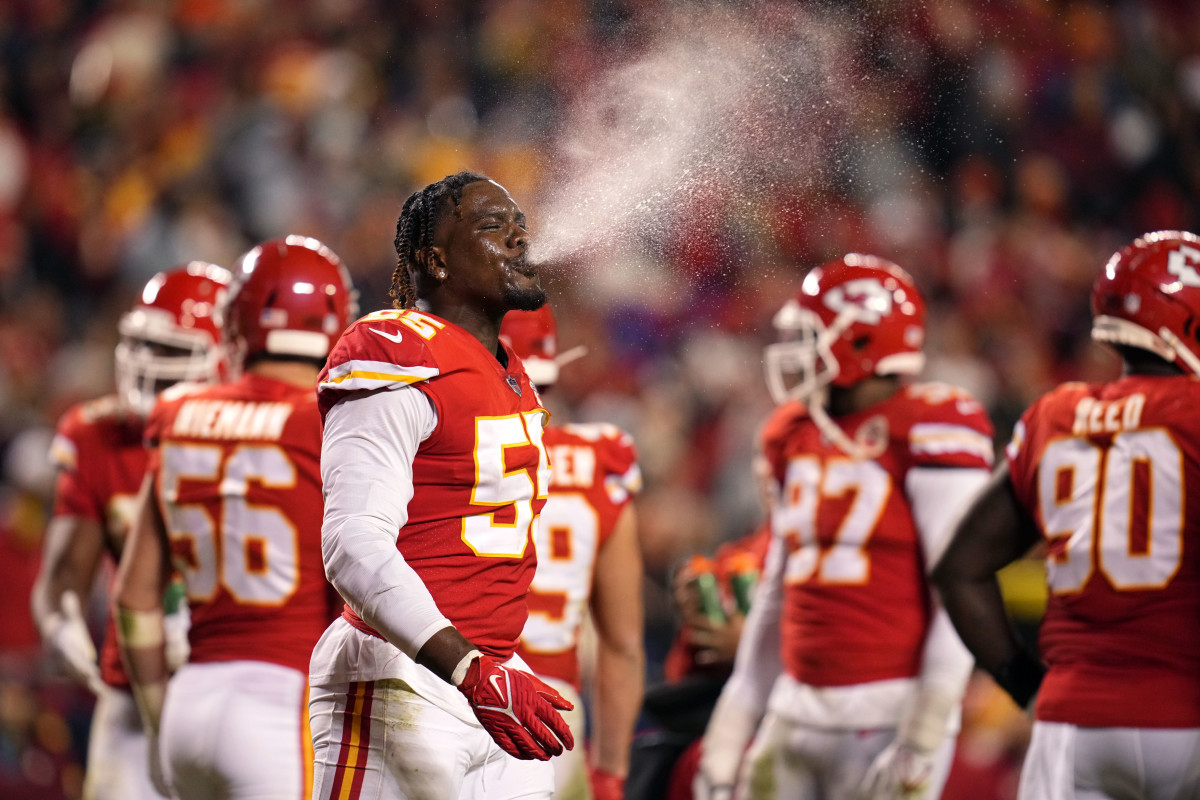 Nov 1, 2021; Kansas City, Missouri, USA; Kansas City Chiefs defensive end Frank Clark (55) spits out water during the second half against the New York Giants at GEHA Field at Arrowhead Stadium. Mandatory Credit: Jay Biggerstaff-USA TODAY Sports