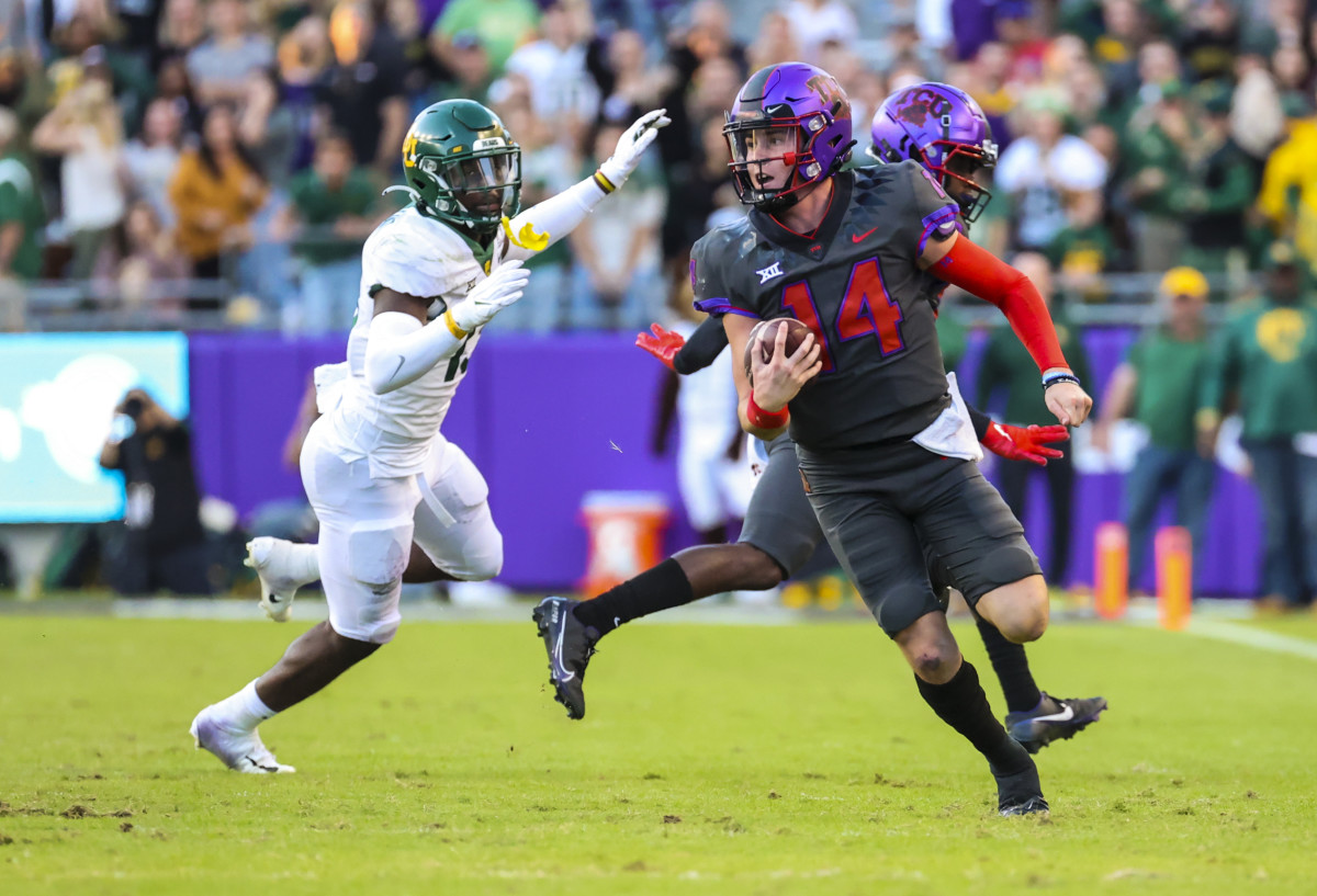 Nov 6, 2021; Fort Worth, Texas, USA; TCU Horned Frogs quarterback Chandler Morris (14) runs with the ball during the second half against the Baylor Bears at Amon G. Carter Stadium.