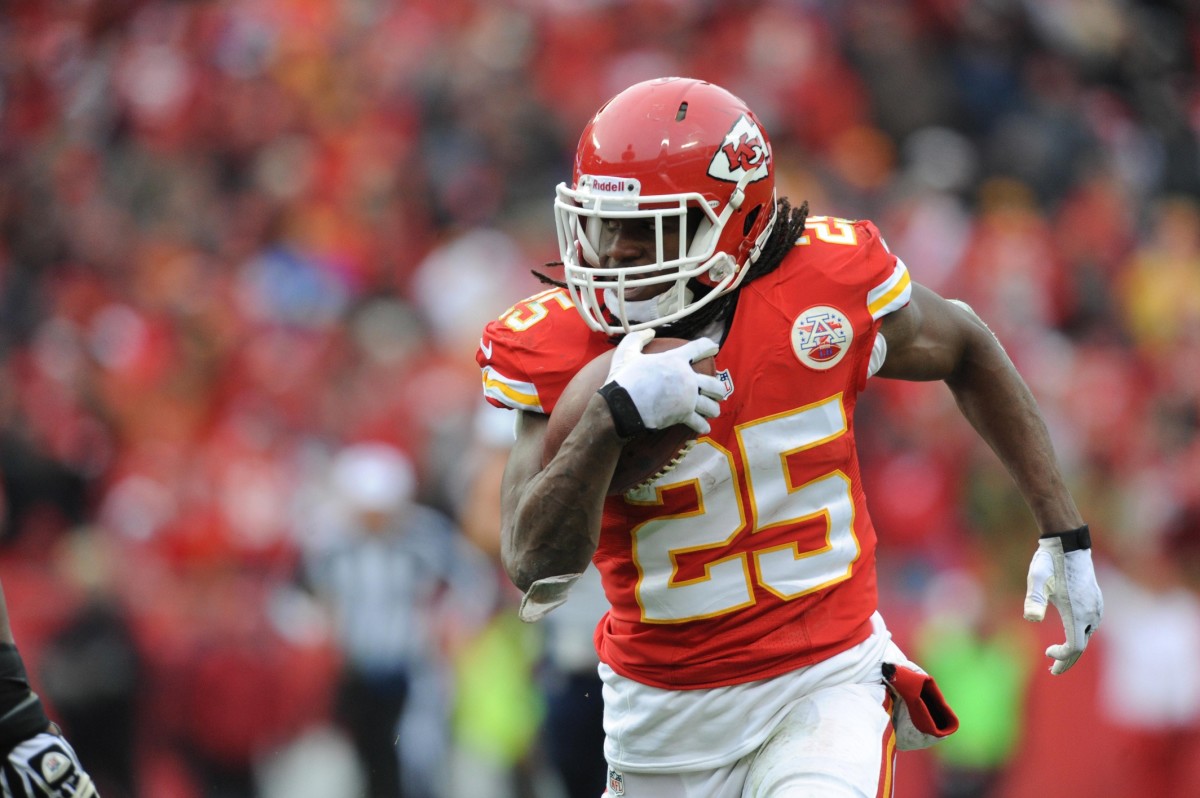 Nov 24, 2013; Kansas City, MO, USA; Kansas City Chiefs running back Jamaal Charles (25) runs the ball during the second half of the game against the San Diego Chargers at Arrowhead Stadium. The Chargers won 41-38. Mandatory Credit: Denny Medley-USA TODAY Sports