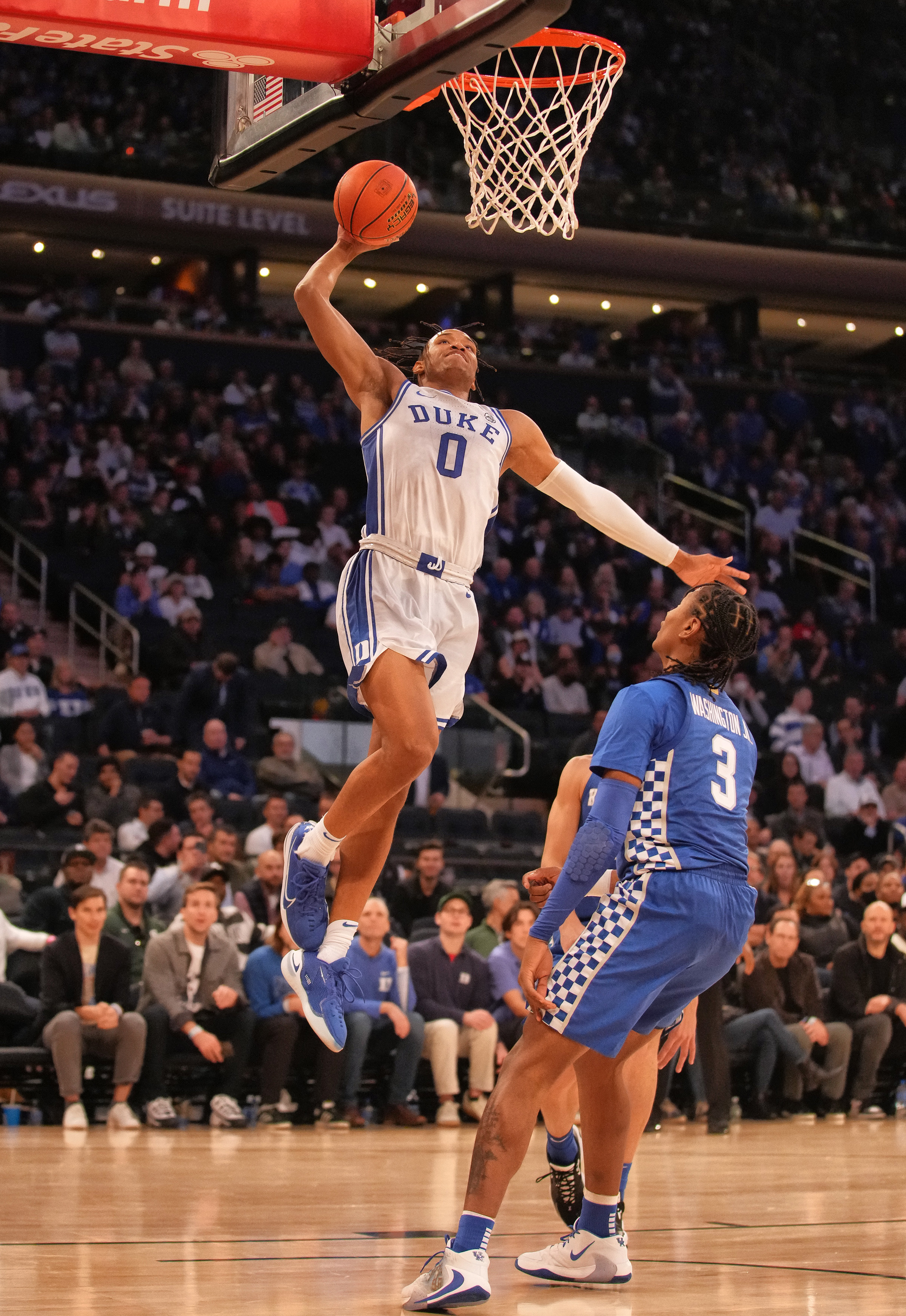 Duke's Wendell Moore dunks against the Kentucky Wildcats at the Champions Classic