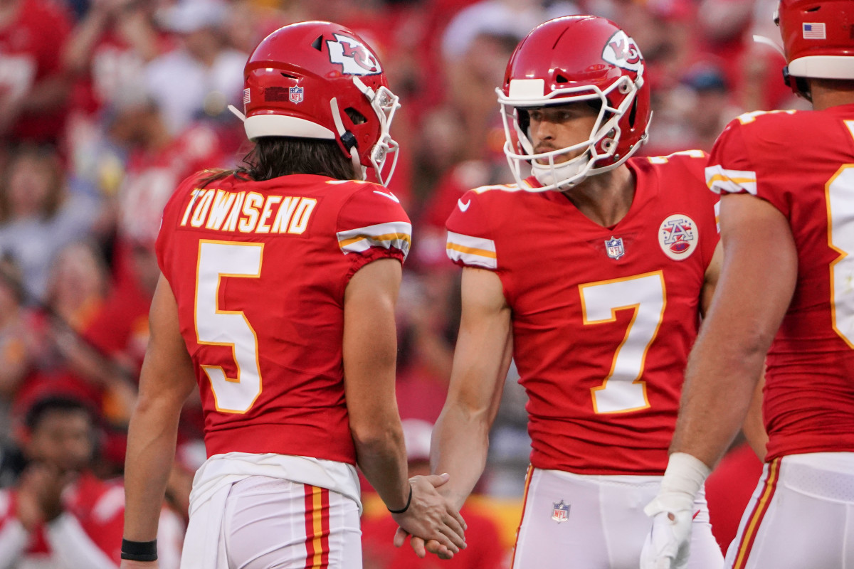Aug 27, 2021; Kansas City, Missouri, USA; Kansas City Chiefs kicker Harrison Butker (7) celebrates with punter Tommy Townsend (5) after kicking the point after touchdown against the Minnesota Vikings during the first quarter at GEHA Field at Arrowhead Stadium. Mandatory Credit: Denny Medley-USA TODAY Sports