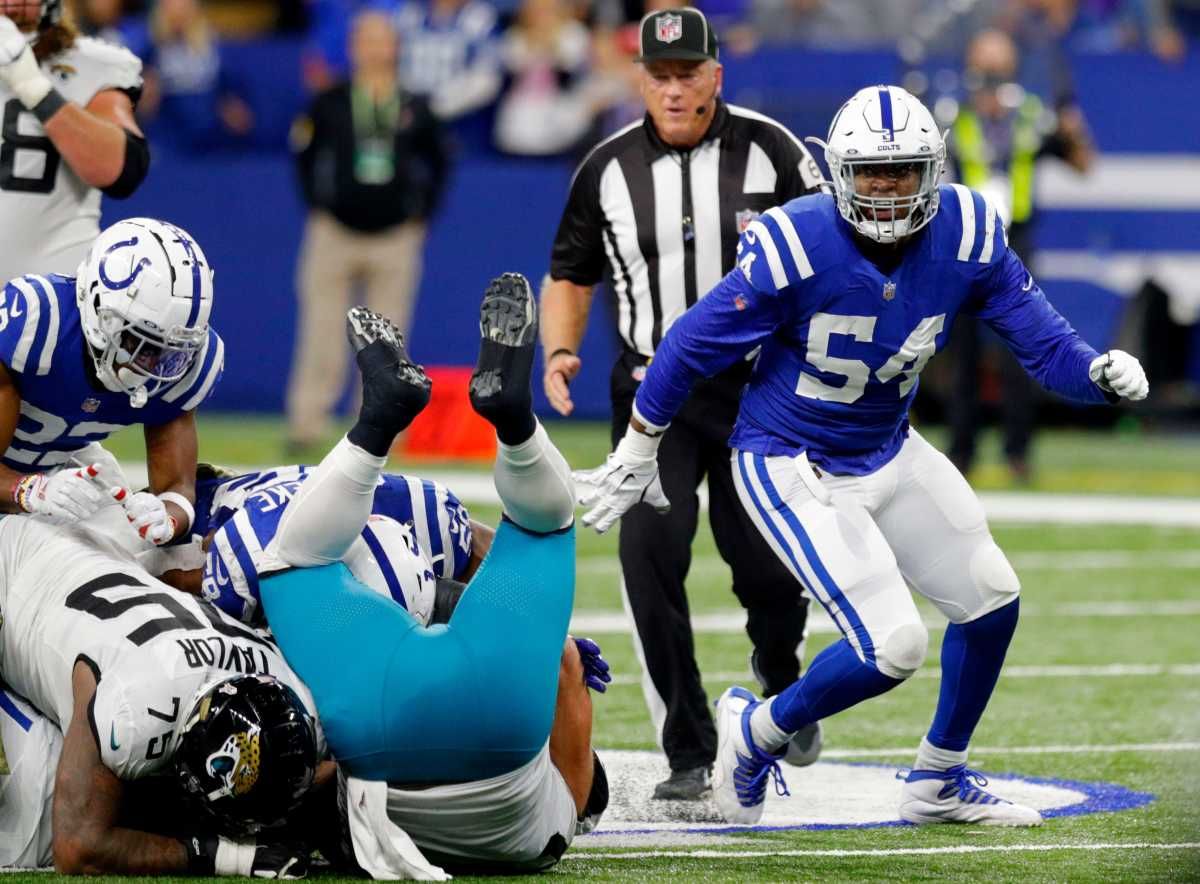 Indianapolis Colts defensive end Dayo Odeyingbo (54) celebrates after sacking Jacksonville Jaguars quarterback Trevor Lawrence (16) on Sunday, Nov. 14, 2021, during a game against the Jacksonville Jaguars at Lucas Oil Stadium in Indianapolis.