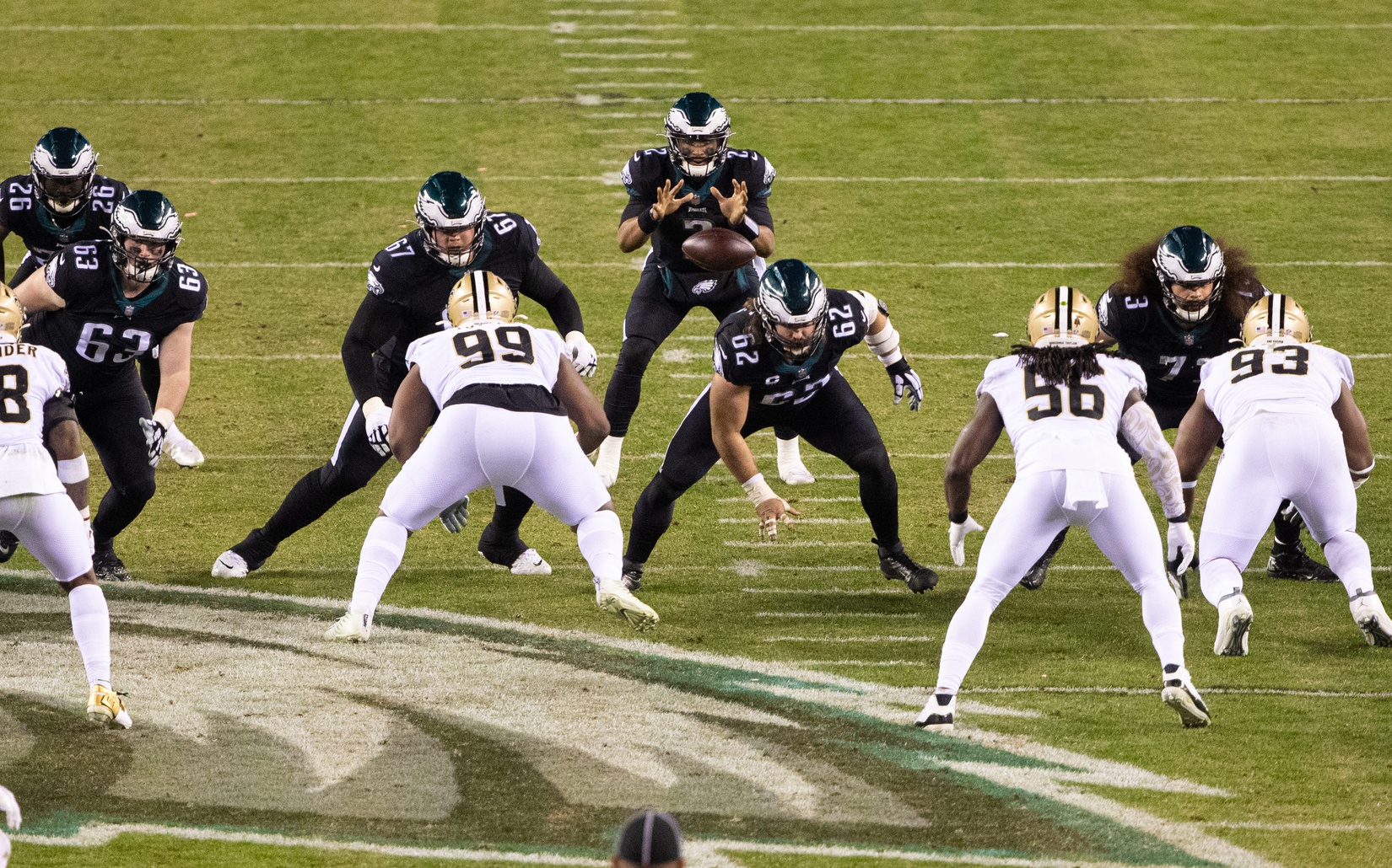 Eagles quarterback Jalen Hurts (2) receives a snap from center Jason Kelce (62) against the New Orleans Saints. Mandatory Credit: Bill Streicher-USA TODAY Sports