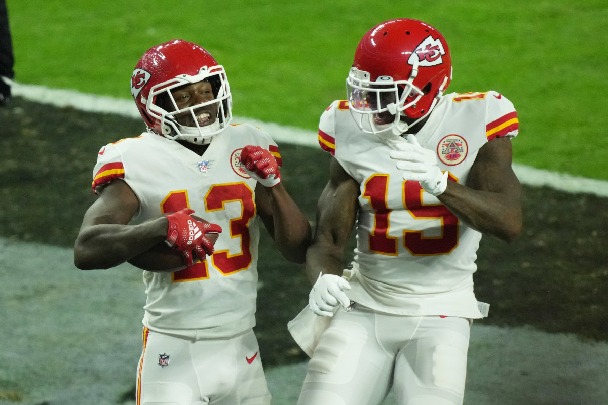 Nov 14, 2021; Paradise, Nevada, USA; Kansas City Chiefs wide receiver Byron Pringle (13) celebrates with Kansas City Chiefs wide receiver Josh Gordon (19) after scoring a touchdown against the Las Vegas Raiders in the fourth quarter at Allegiant Stadium. Mandatory Credit: Kirby Lee-USA TODAY Sports