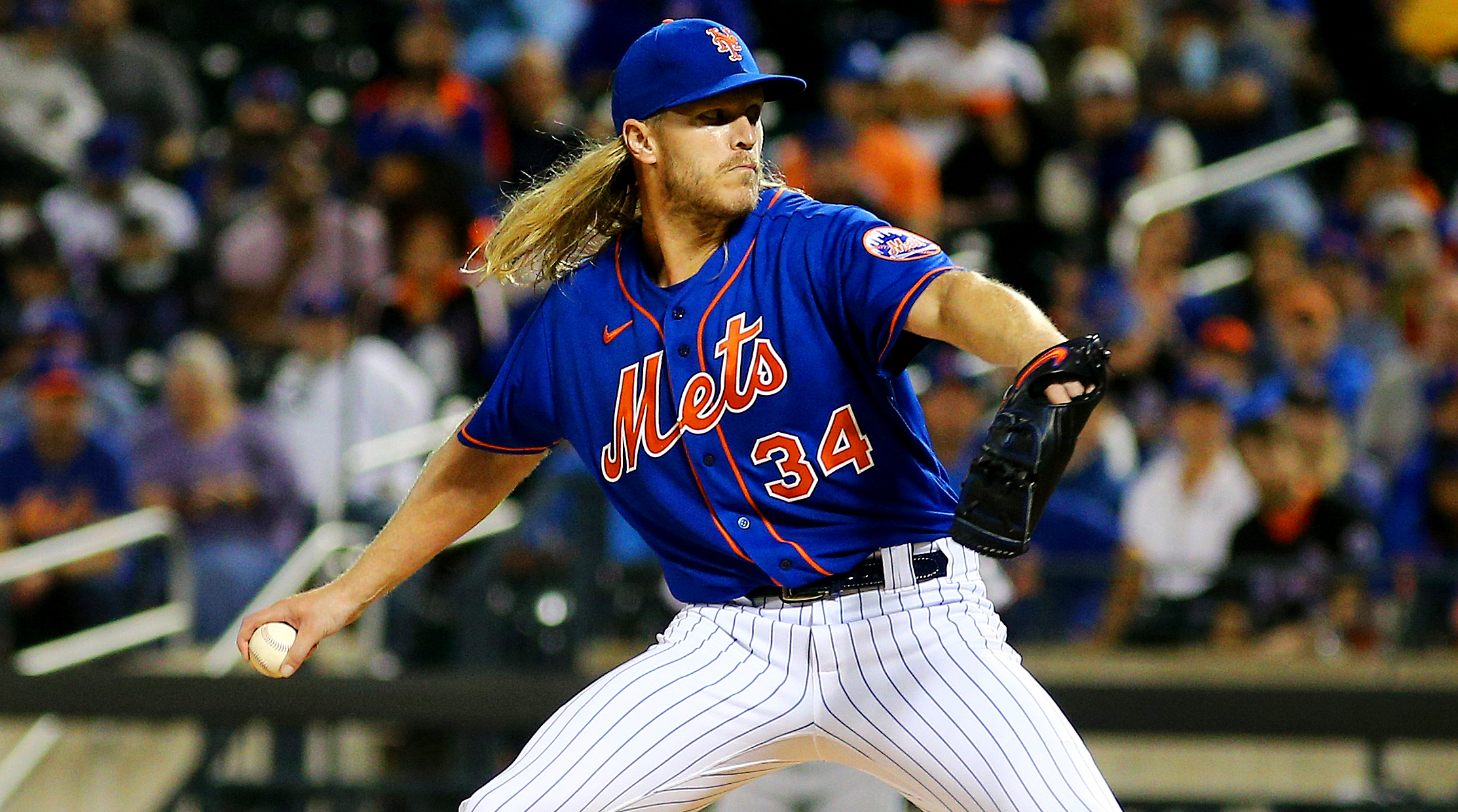 Sep 28, 2021; New York City, New York, USA; New York Mets starting pitcher Noah Syndergaard (34) throws against the Miami Marlins during the first inning of game two of a doubleheader at Citi Field.
