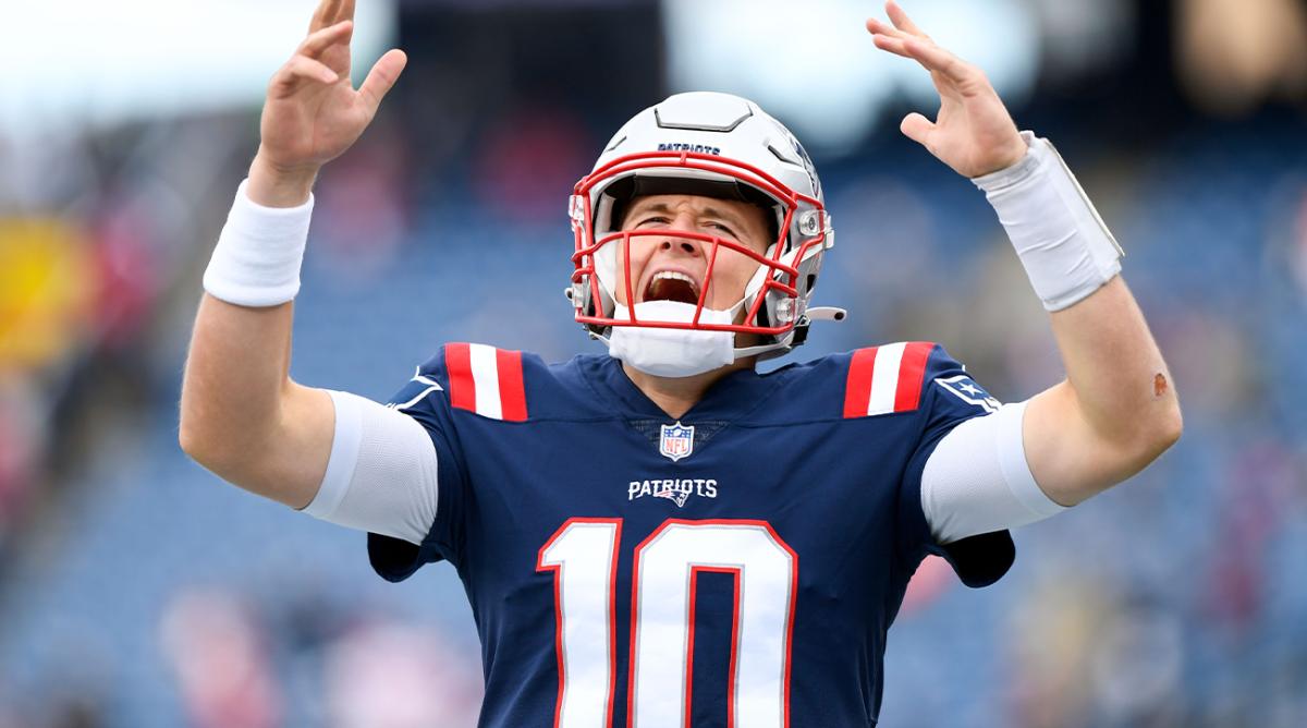 Nov 14, 2021; Foxborough, Massachusetts, USA; New England Patriots quarterback Mac Jones (10) reacts before a game against the Cleveland Browns at Gillette Stadium.