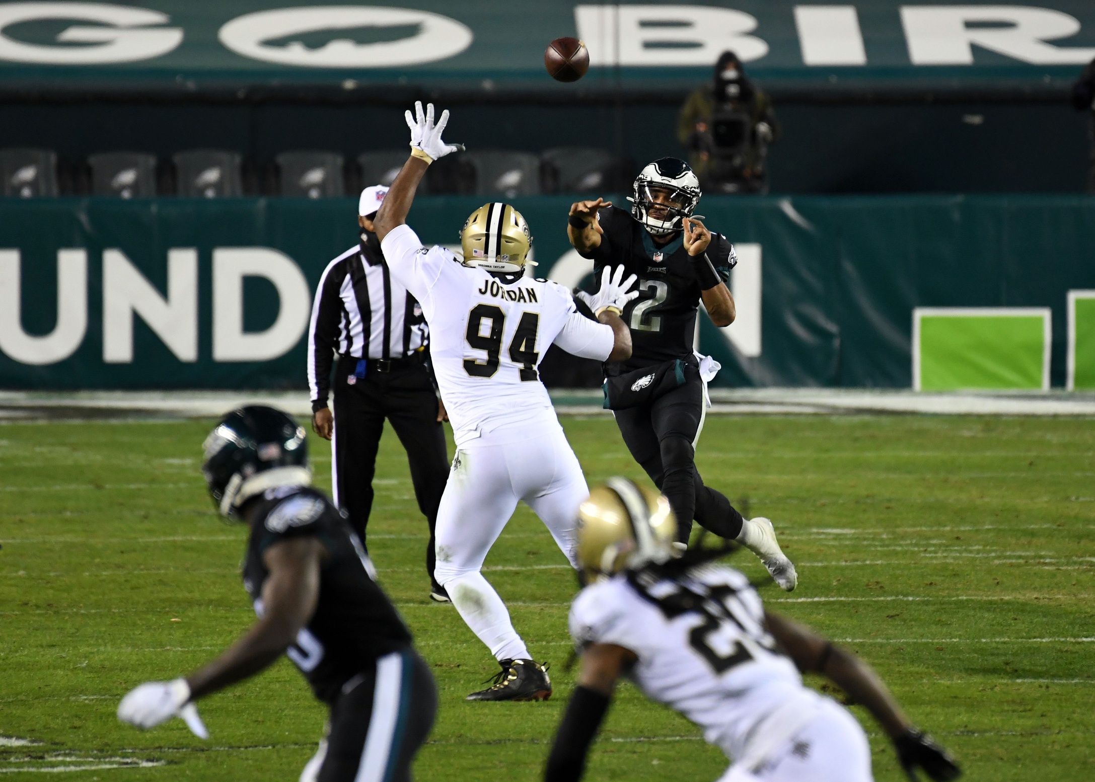 Philadelphia Eagles quarterback Jalen Hurts (2) passes as New Orleans Saints defensive end Cameron Jordan (94) defends. Mandatory Credit: James Lang-USA TODAY Sports