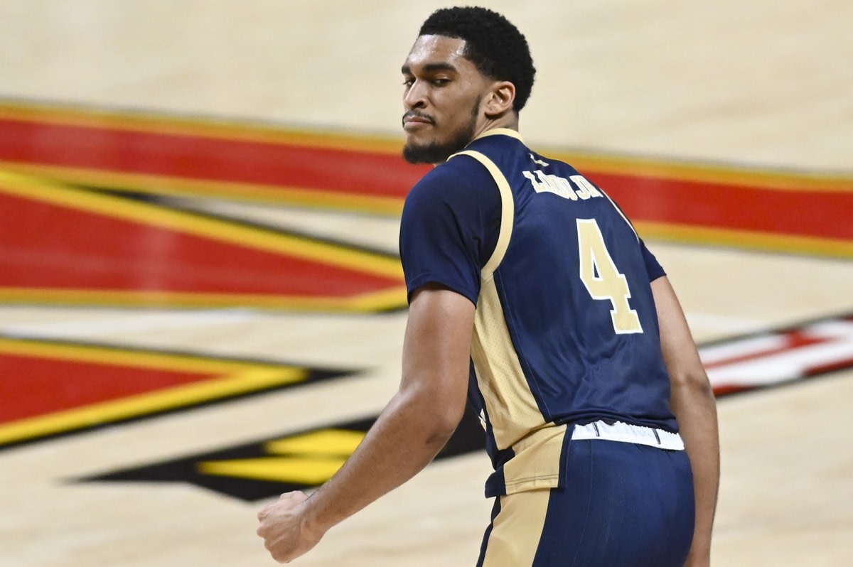 Nov 11, 2021; College Park, Maryland, USA; George Washington Colonials forward Ricky Lindo Jr. (4)reacts after making basket during the game against the Maryland Terrapins at Xfinity Center. Mandatory Credit: Tommy Gilligan-USA TODAY Sports