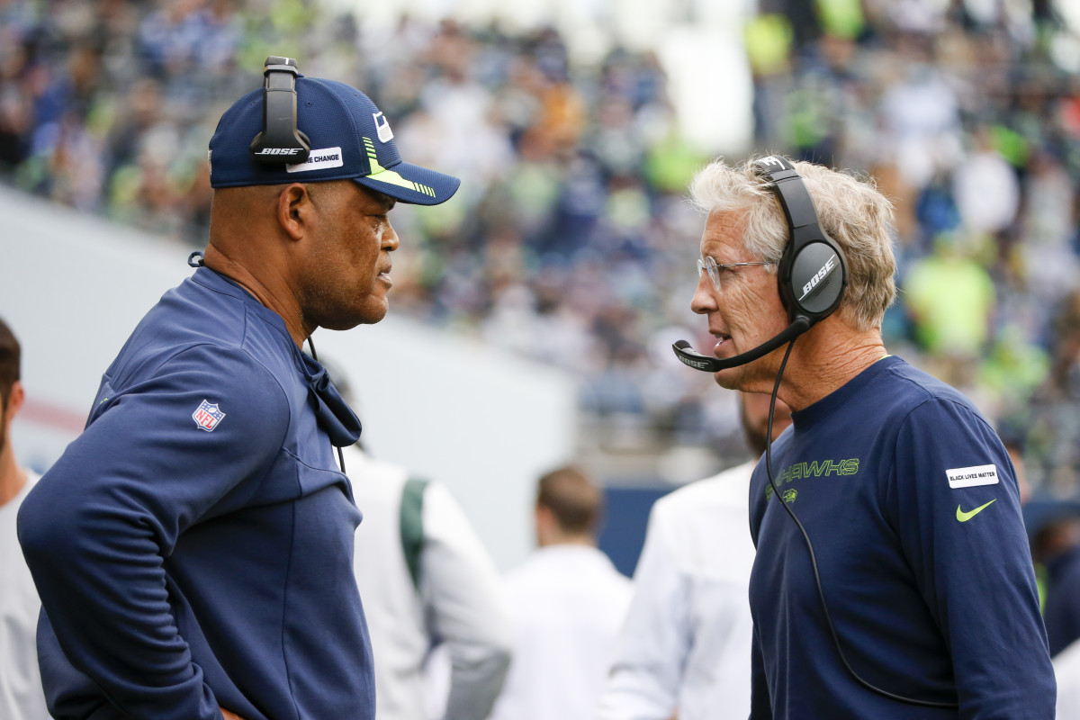 NFL: Tennessee Titans at Seattle Seahawks Sep 19, 2021; Seattle, Washington, USA; Seattle Seahawks head coach Pete Carroll, right, talks with defensive coordinator Ken Norton, Jr., left, during the fourth quarter against the Tennessee Titans at Lumen Field.