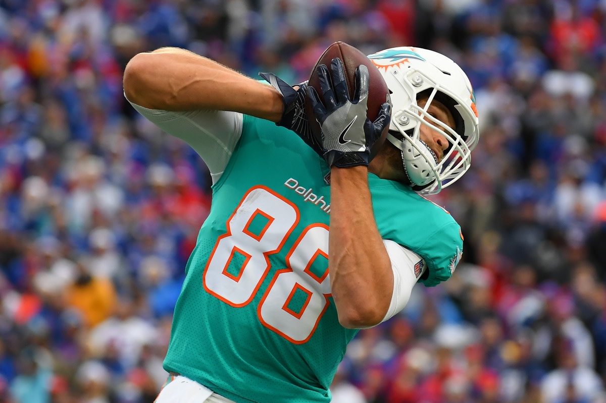 Oct 31, 2021; Orchard Park, New York, USA; Miami Dolphins tight end Mike Gesicki (88) catches the ball against the Buffalo Bills during the second half at Highmark Stadium. Mandatory Credit: Rich Barnes-USA TODAY Sports