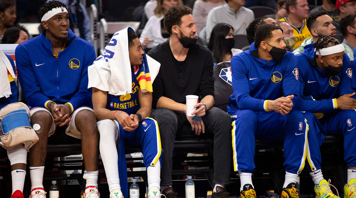 Klay Thompson sits on the bench.