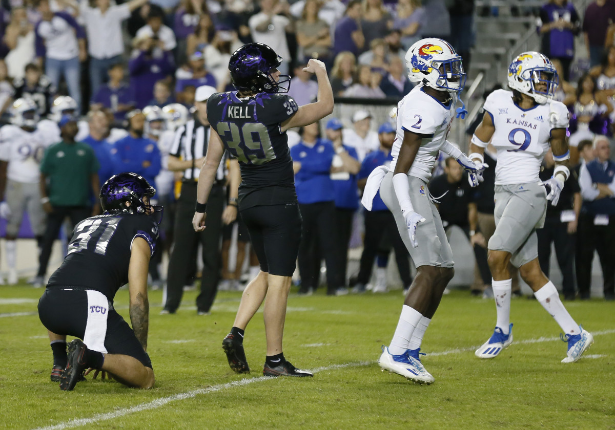 Nov 20, 2021; Fort Worth, Texas, USA; TCU Horned Frogs place kicker Griffin Kell (39) follows thru on the eventual game winning field goal against the Kansas Jayhawks during the second half at Amon G. Carter Stadium. Mandatory Credit: Raymond Carlin III-USA TODAY Sports