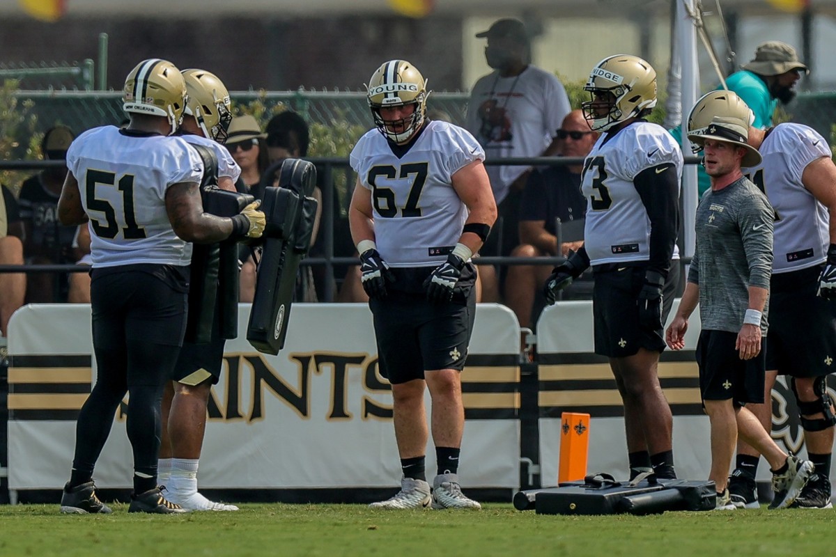 New Orleans Saints offensive tackle Landon Young (67) looks on during a training camp session. Mandatory Credit: Stephen Lew-USA TODAY 
