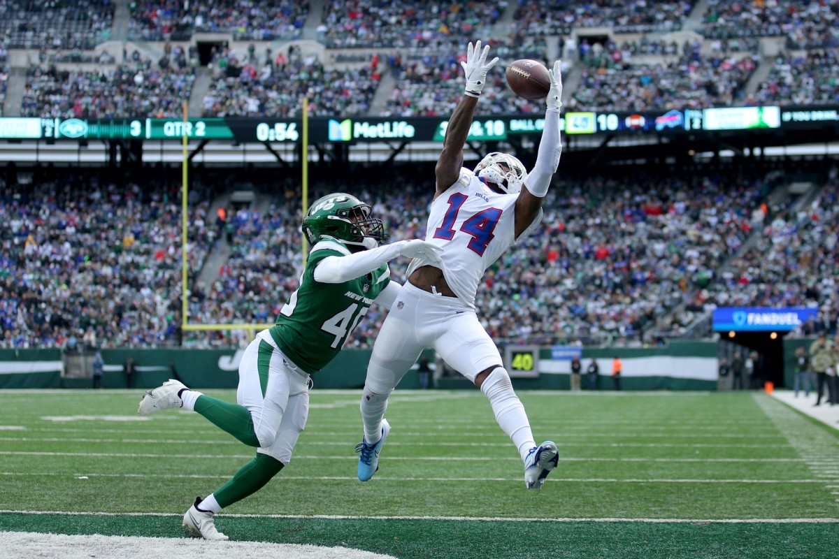 Buffalo receiver Stefon Diggs (14) catches a touchdown pass against the New York Jets. Mandatory Credit: Brad Penner-USA TODAY Sports