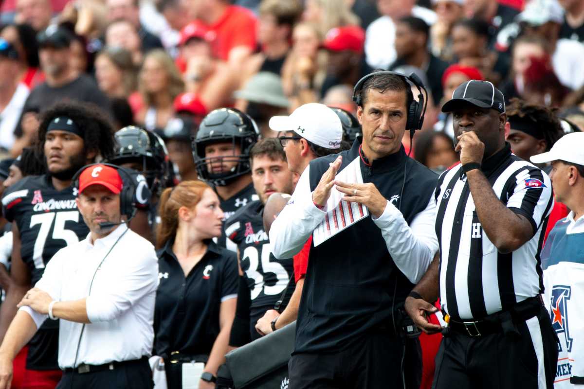 Cincinnati Bearcats head coach Luke Fickell calls a timeout in the first half of the NCAA football game between the Cincinnati Bearcats and the Miami Redhawks on Saturday, Sept. 4, 2021, at Nippert Stadium in Cincinnati. Cincinnati Bearcats Miami Redhawks