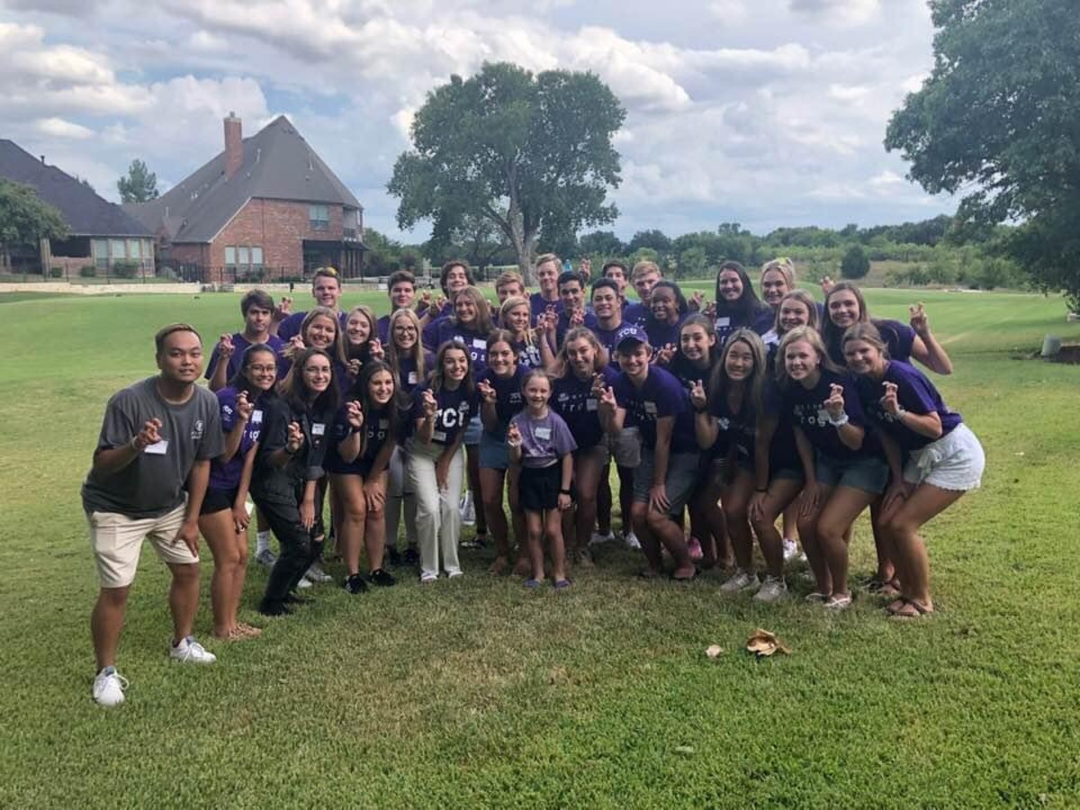 In 2019, George and Susan hosted a group of incoming freshman from Waits Hall at their house for the Family First Dinner.