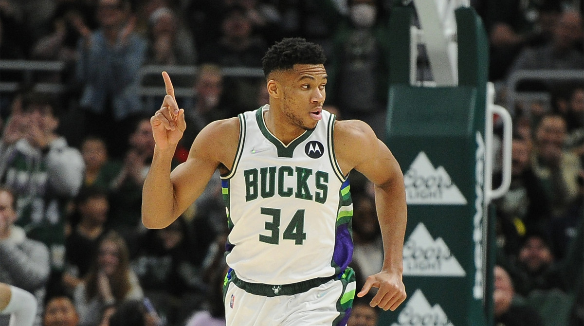 Nov 24, 2021; Milwaukee, Wisconsin, USA; Milwaukee Bucks forward Giannis Antetokounmpo (34) celebrates after a dunk against the Detroit Pistons in the first half at Fiserv Forum.