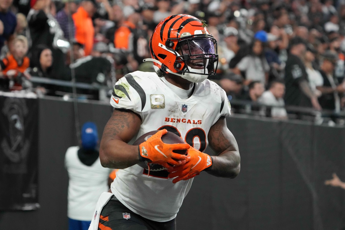 Nov 21, 2021; Paradise, Nevada, USA; Cincinnati Bengals running back Joe Mixon (28) celebrates after scoring on a 20-yard touchdown run against the Las Vegas Raiders in the second half at Allegiant Stadium. Mandatory Credit: Kirby Lee-USA TODAY Sports