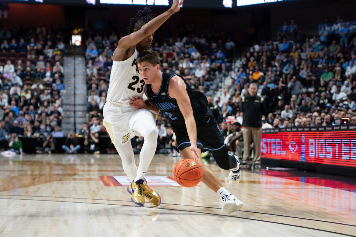 Nov 21, 2021; Uncasville, CT, USA; Villanova Wildcats guard Collin Gillespie (2) dribbles the ball against Purdue Boilermakers guard Jaden Ivey (23) defending during the second half at Mohegan Sun Arena. Mandatory Credit: Gregory Fisher-USA TODAY Sports