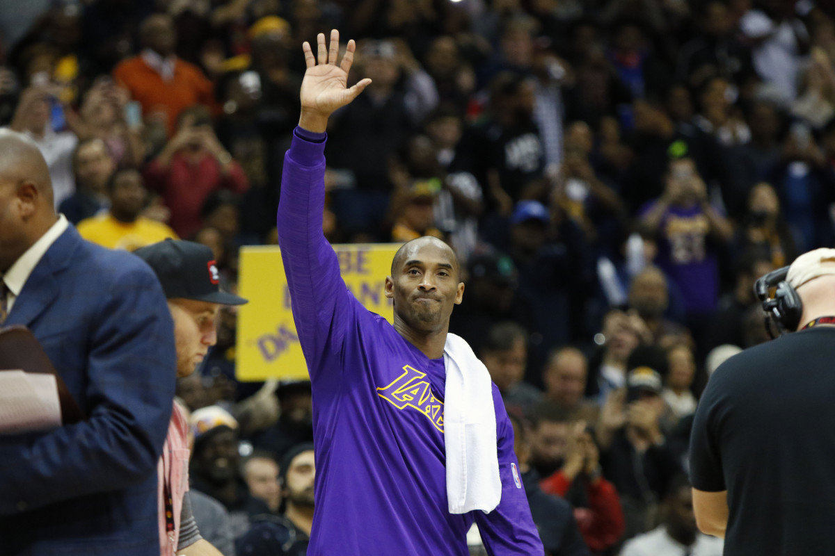 Los Angeles Lakers forward Kobe Bryant (24) is honored after the first quarter against the Atlanta Hawks at Philips Arena.