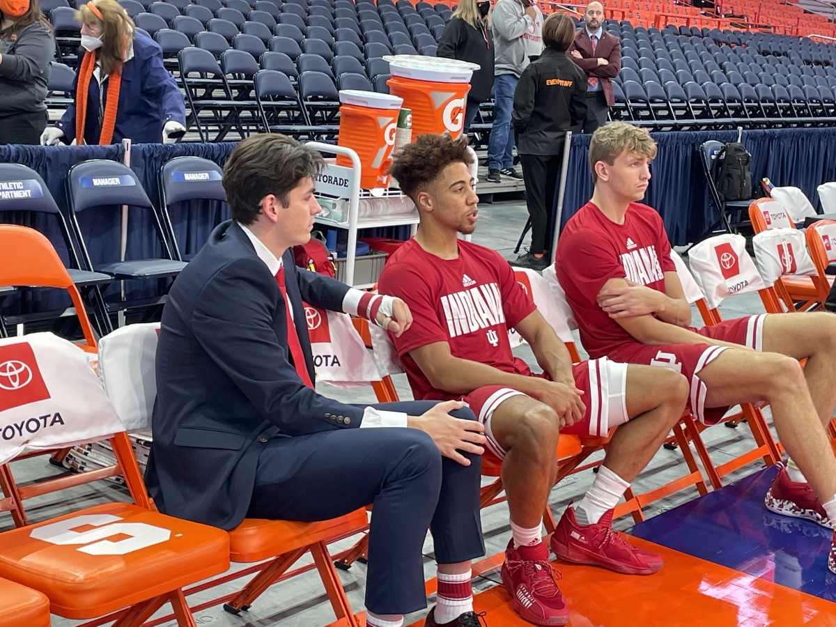 Indiana guard Rob Phinisee (center) went through pregame warmups and is dressed and ready to go for Tuesday night's game. He's missed three games with a calf injury.