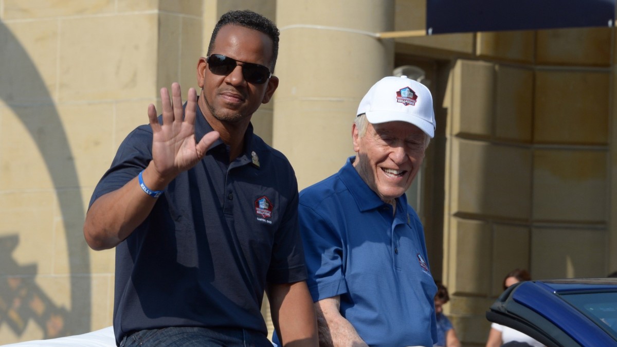Andre Reed (L) and Marv Levy at the TimkenSteel Grand Parade on Cleveland Avenue in advance of the 2014 Pro Football Hall of Fame Enshrinement.